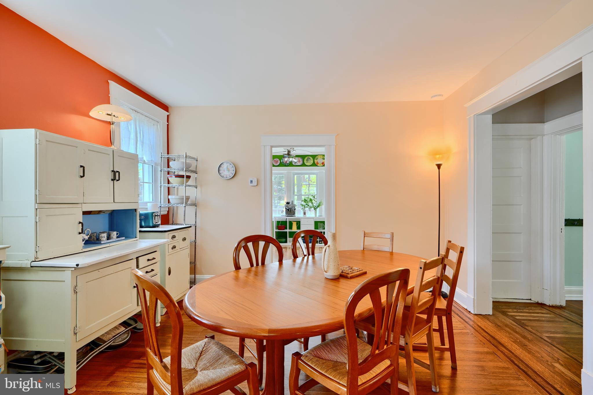 1111 Overbrook Road Baltimore, MD 21239 - Photo 9 of 47 a view of a dining room with furniture and a kitchen