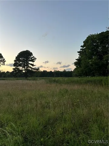 a view of lake with mountain