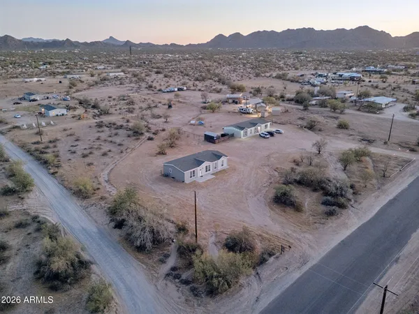 a view of a backyard of a house