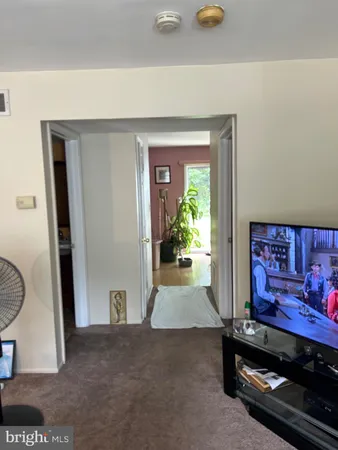 a view of livingroom with furniture and wooden floor
