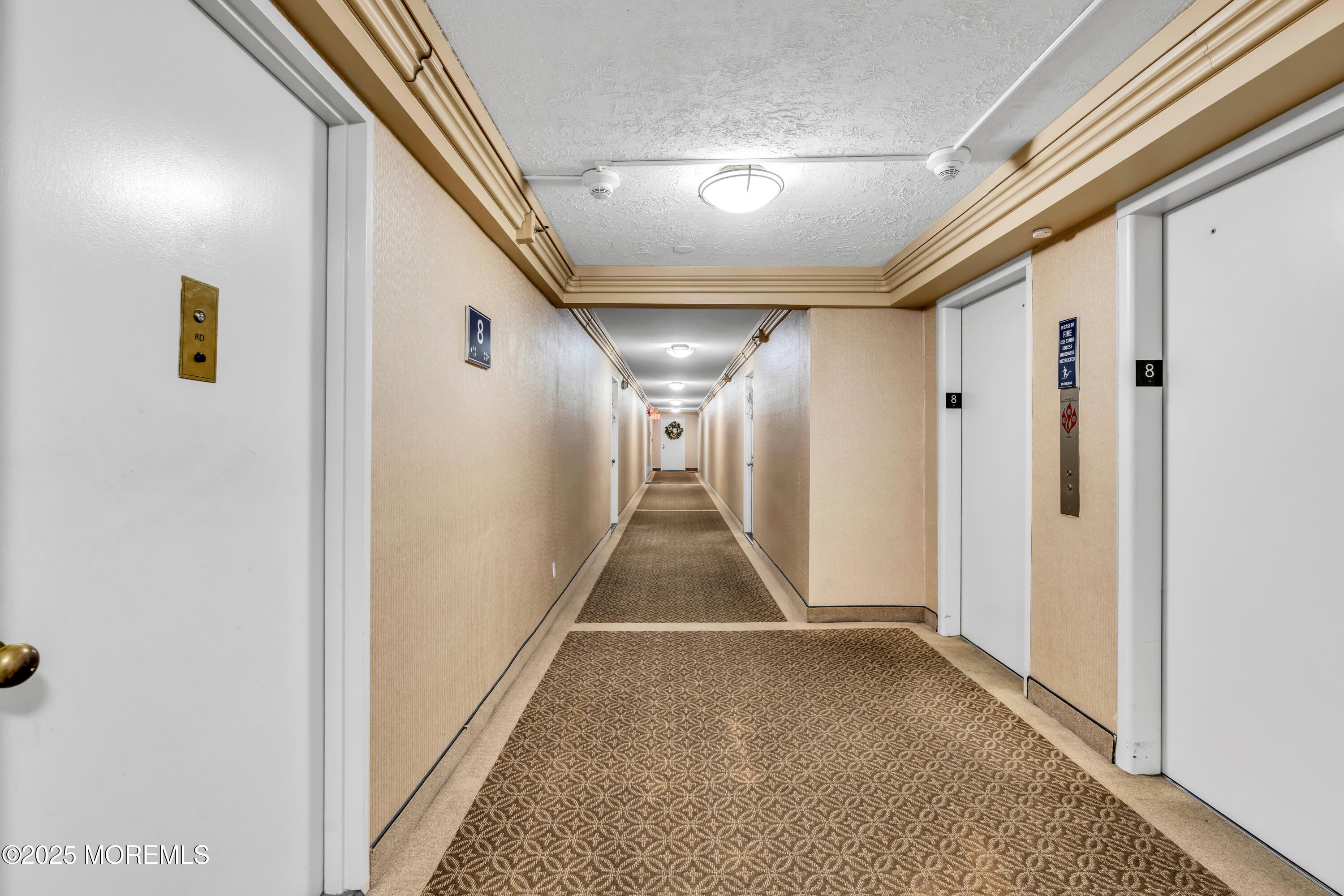 28 Riverside Avenue, Unit 8J Red Bank, NJ 07701 - Photo 19 of 27 Floor Hallway