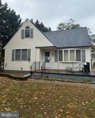 a front view of a house with yard