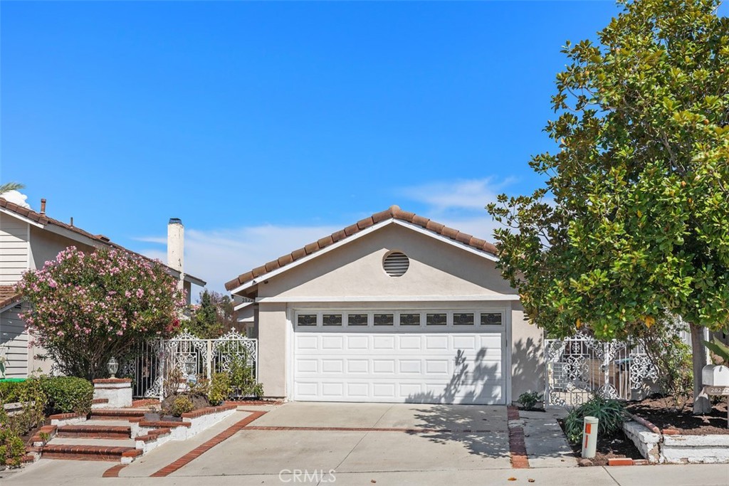 28222 Via Alfonse Laguna Niguel, CA 92677 - Photo 1 of 10 a front view of a house with a yard