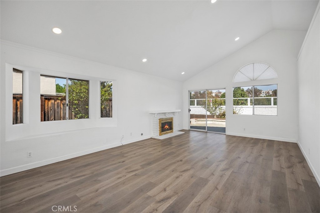 28222 Via Alfonse Laguna Niguel, CA 92677 - Photo 3 of 10 a view of a livingroom with wooden floor and white walls
