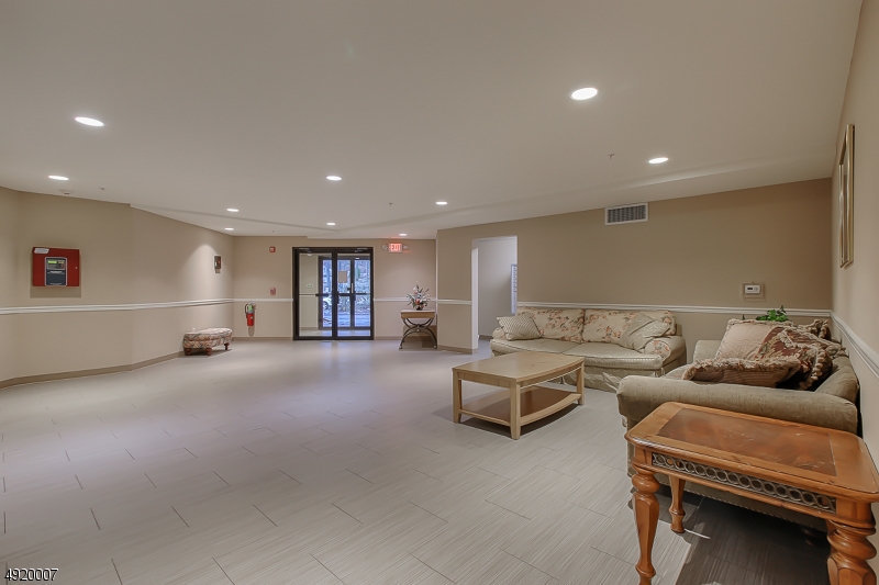 2889 Highway 10, Unit 1310 Morris Plains, NJ 07950 - Photo 12 of 16 a living room with furniture