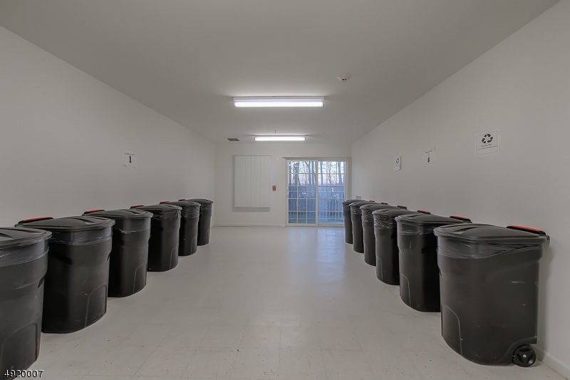 2889 Highway 10, Unit 1310 Morris Plains, NJ 07950 - Photo 10 of 16 a kitchen with refrigerator and window