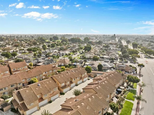 an aerial view of residential building with parking space