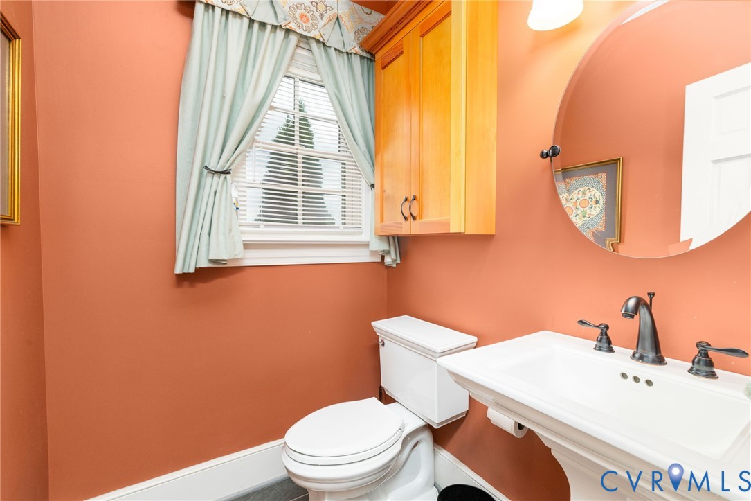 2284 Wallace's Bridge Road Lunenburg, VA 23952 - Photo 17 of 89 Pedestal sink with dark bronze faucet, wall-mounte