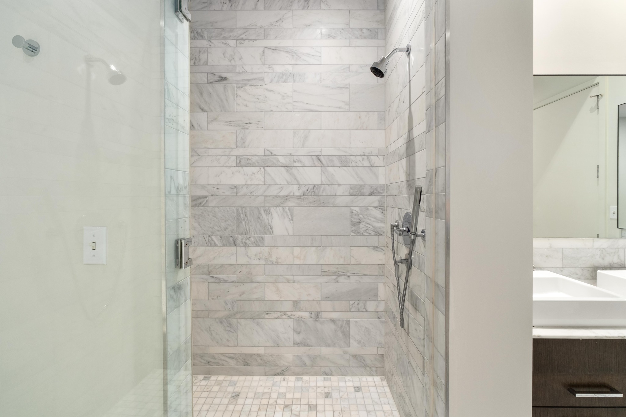 210 Lavaca Street, Unit 1810 Austin, TX 78701 - Photo 16 of 28 Bathroom with vanity and a shower stall