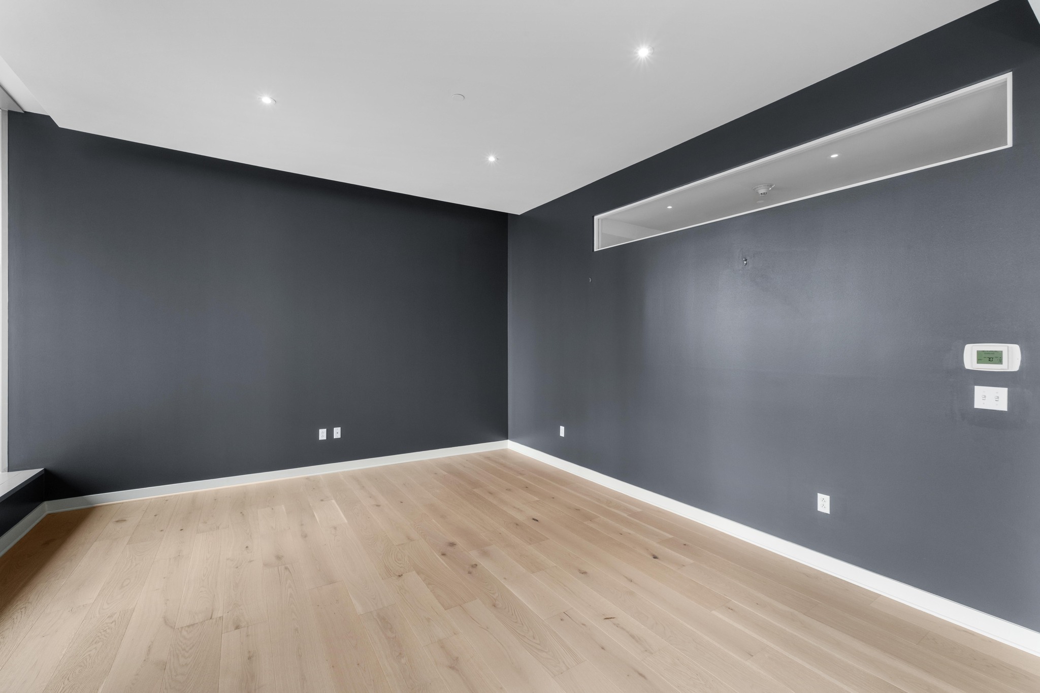 210 Lavaca Street, Unit 1810 Austin, TX 78701 - Photo 4 of 28 Empty room featuring light wood-style floors and recessed lighting