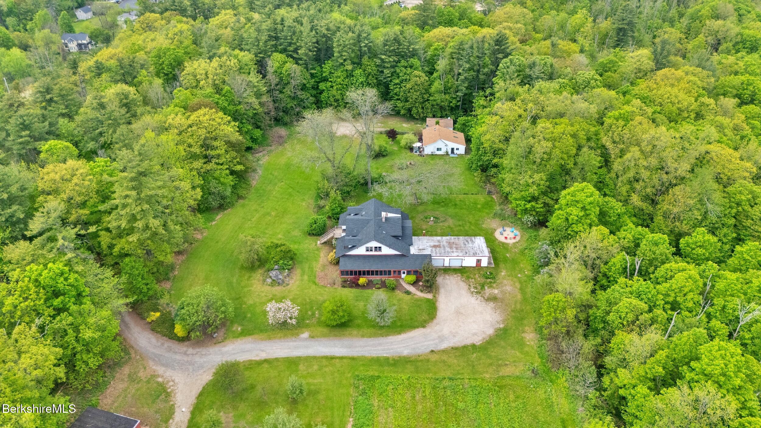20 East Dugway Road Lenox, MA 01240 - Photo 75 of 84 an aerial view of a house with a yard basket ball court and outdoor seating