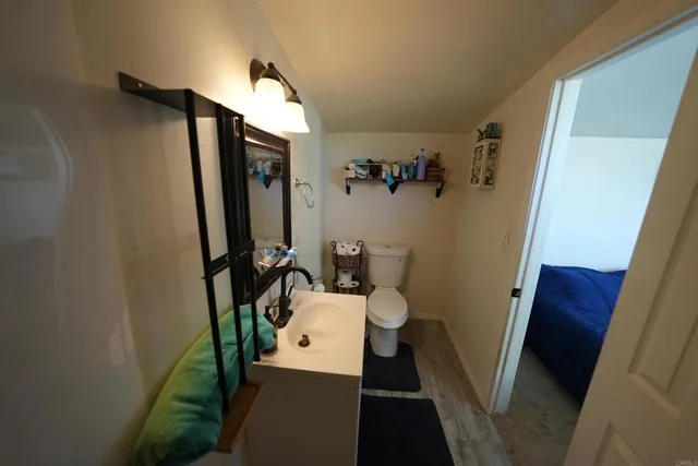 a bathroom with a sink and toilet