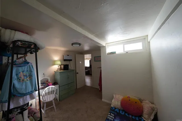 a room with furniture and air hockey table