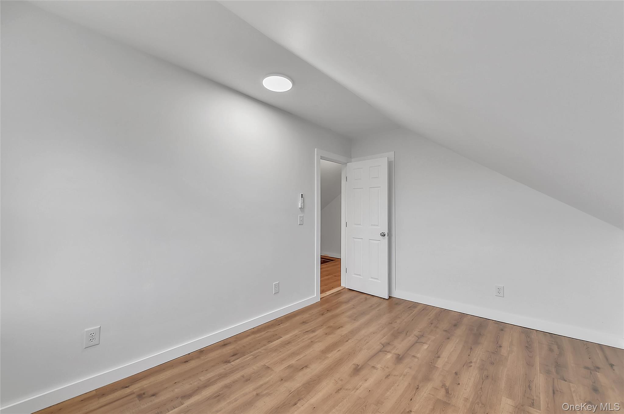 67 Jacobs Road Westtown, NY 10998 - Photo 27 of 36 Bonus room featuring wood finished floors and vaulted ceiling