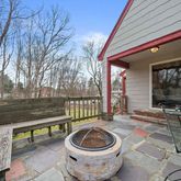 a house view with a sitting space and garden space