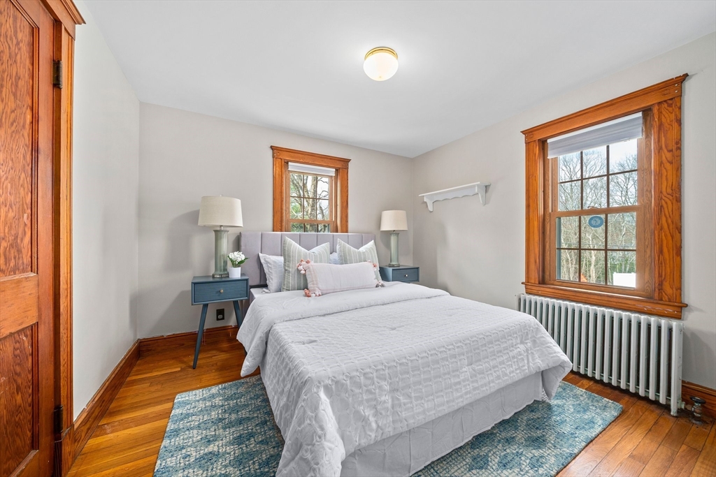 236 High Street Canton, MA 02021 - Photo 11 of 25 a bedroom with a bed and a window