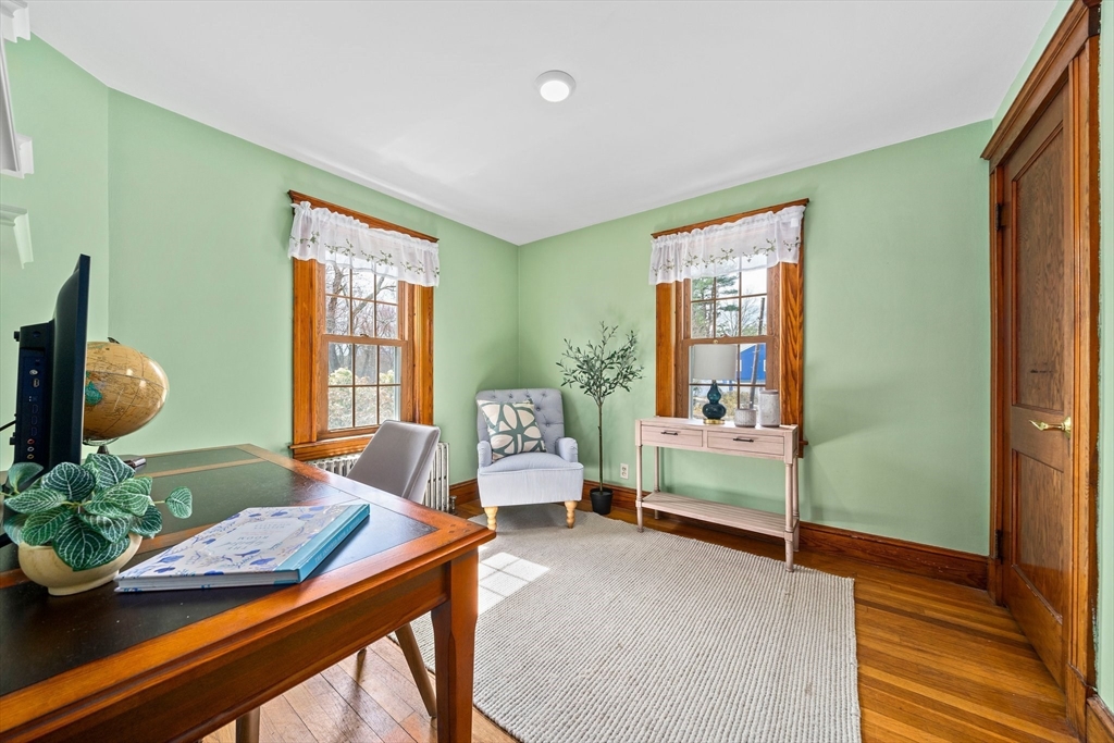 236 High Street Canton, MA 02021 - Photo 12 of 25 a living room with furniture and a potted plant