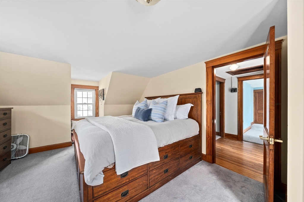 236 High Street Canton, MA 02021 - Photo 13 of 25 a bed room with a bed and a car