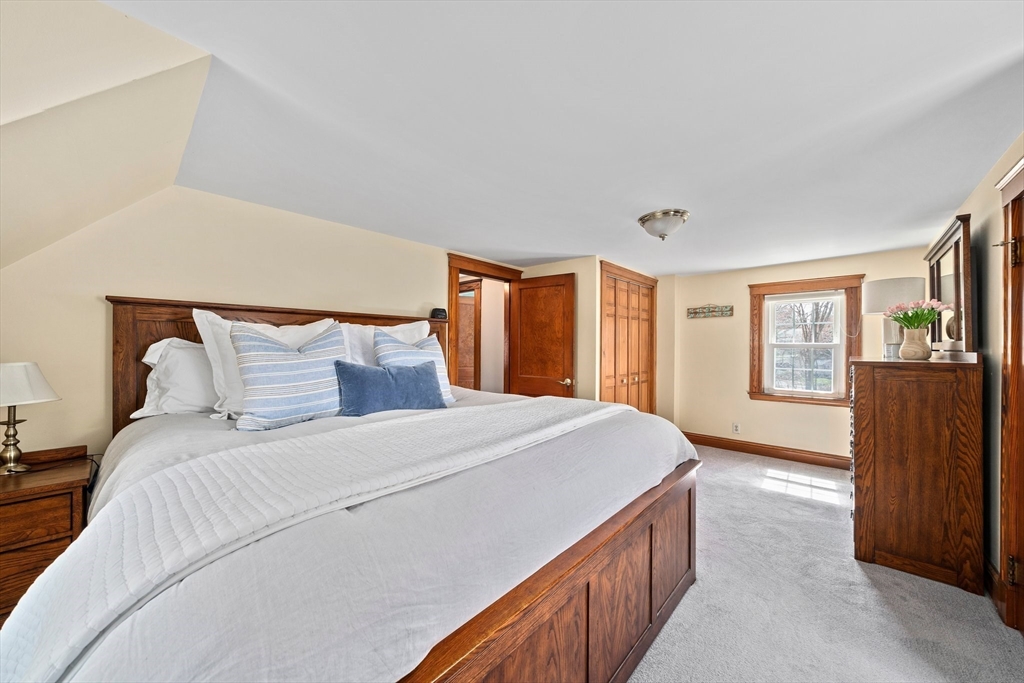 236 High Street Canton, MA 02021 - Photo 14 of 25 a bedroom with a large bed and wooden floor