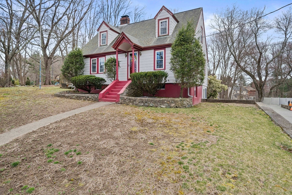 236 High Street Canton, MA 02021 - Photo 4 of 25 a view of front of house with entertaining space