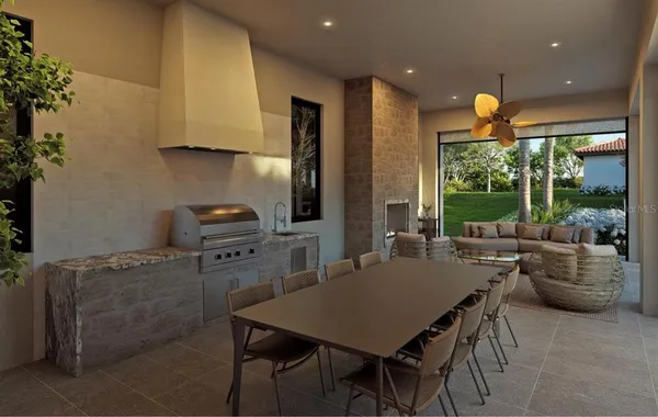 a kitchen with a table chairs and a refrigerator