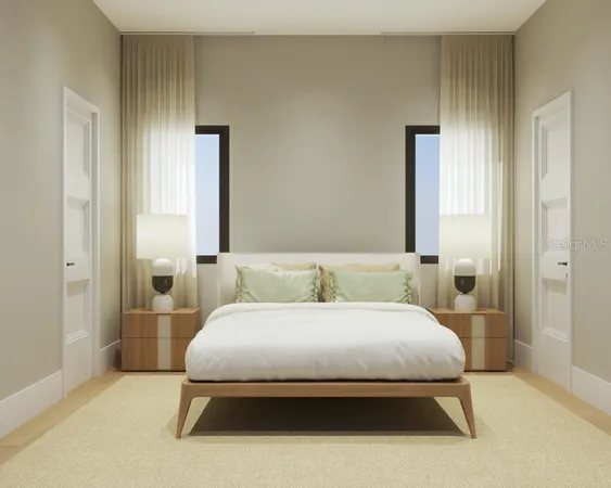 a bedroom with a bed and a table