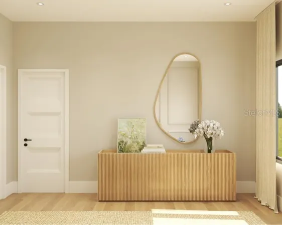 a picture of a living room with a mirror