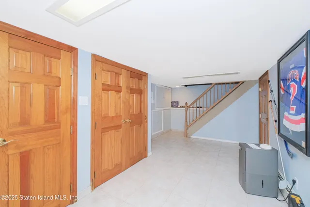 a view of entryway with stairs