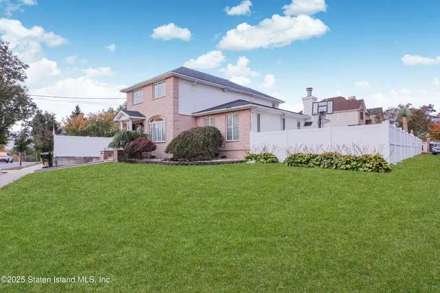 a house view with a garden space