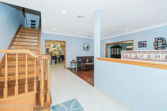 a view of a living room and dining room