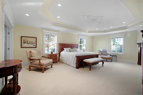 a bedroom with furniture and a couch