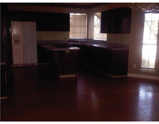 5102 Kings Court Corpus Christi, TX 78413 - Photo 3 of 5 a bathroom with a sink and a mirror