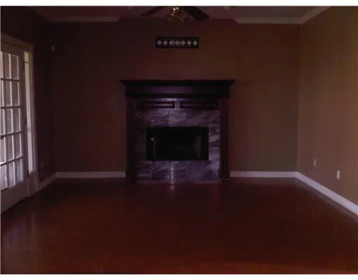 a living room with a fireplace