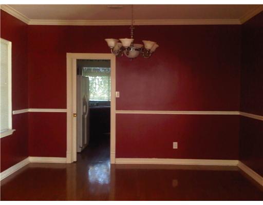 5102 Kings Court Corpus Christi, TX 78413 - Photo 5 of 5 a view of an empty room with wooden floor