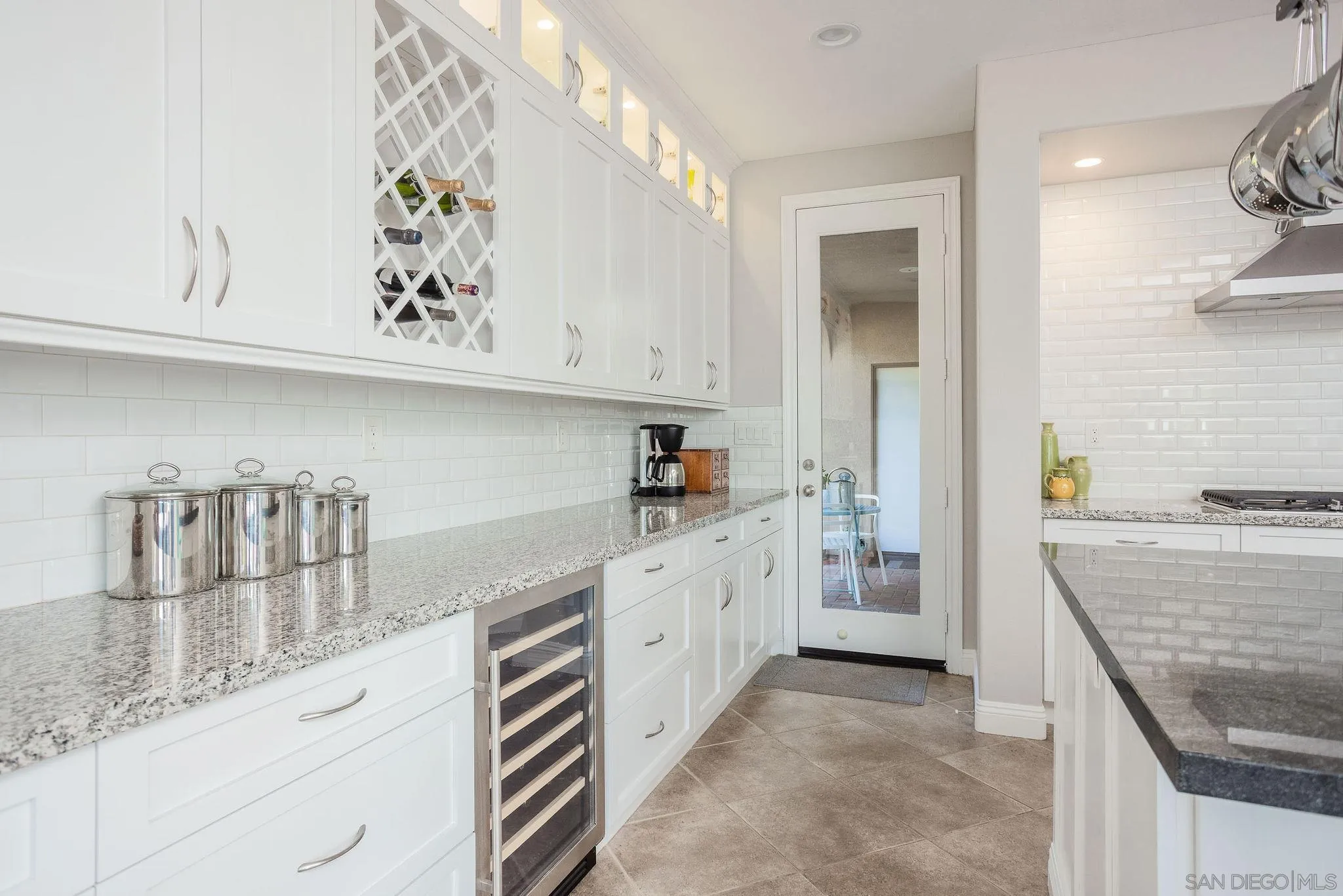 845 Vista Point Circle Vista, CA 92084 - Photo 12 of 58 a kitchen with cabinets and window