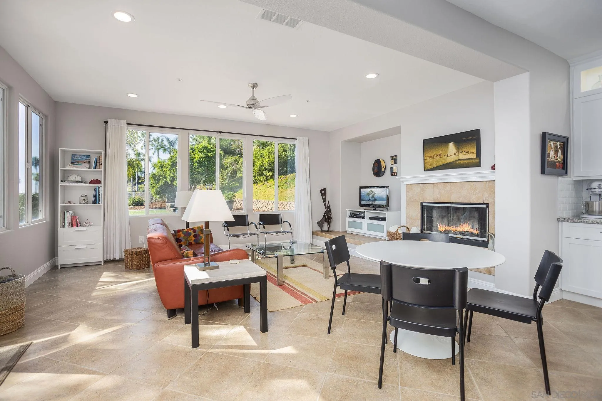 845 Vista Point Circle Vista, CA 92084 - Photo 14 of 58 a living room with furniture and a fireplace