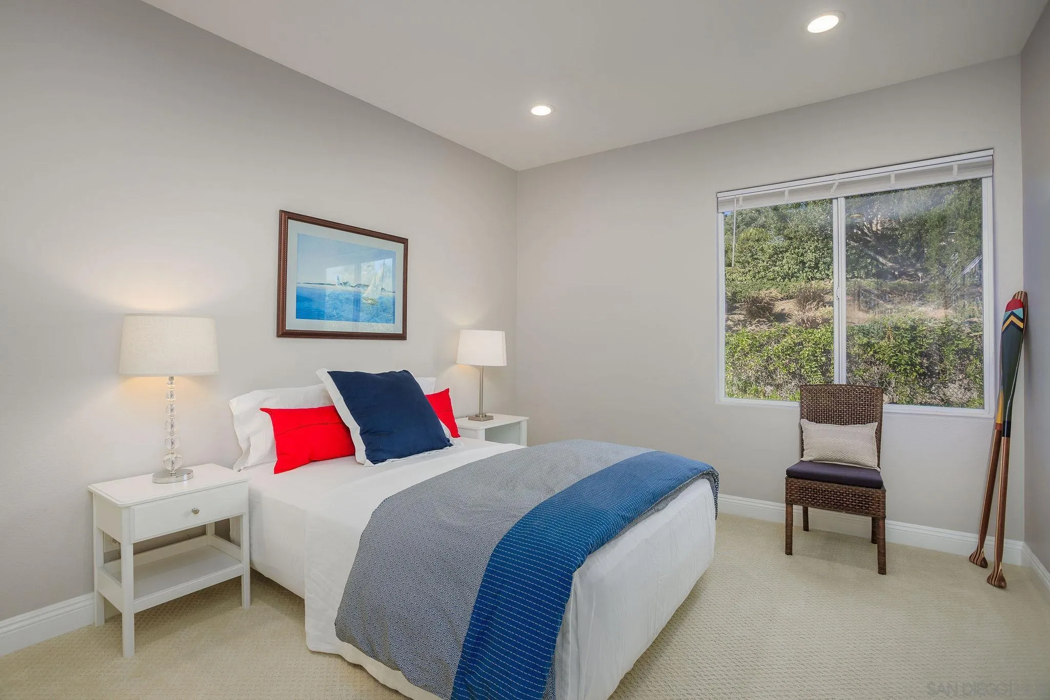 845 Vista Point Circle Vista, CA 92084 - Photo 30 of 58 a bedroom with a bed and a window