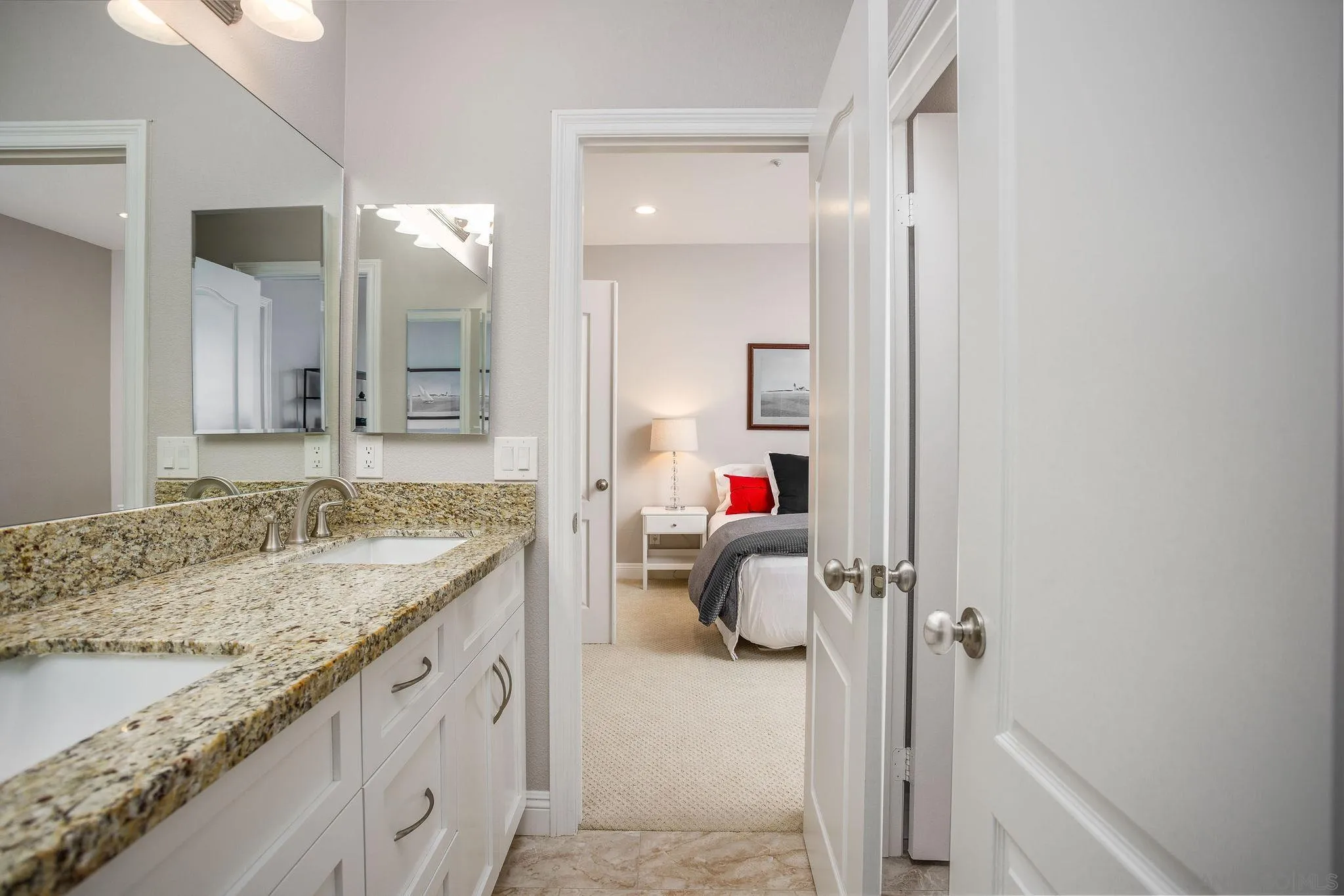 845 Vista Point Circle Vista, CA 92084 - Photo 31 of 58 a bathroom with a granite countertop sink and a mirror