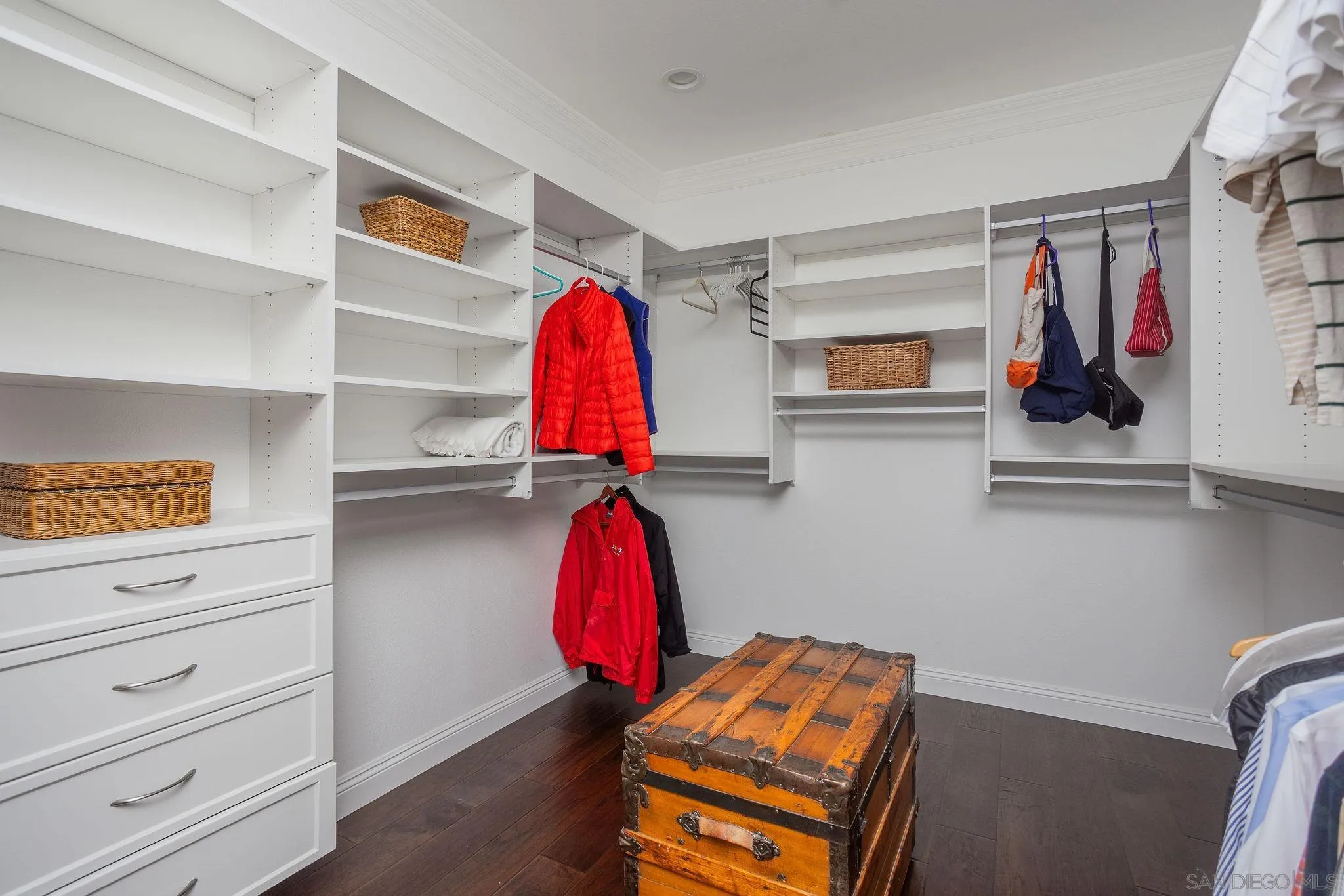 845 Vista Point Circle Vista, CA 92084 - Photo 35 of 58 a view of walk in closet with clothes and shoes