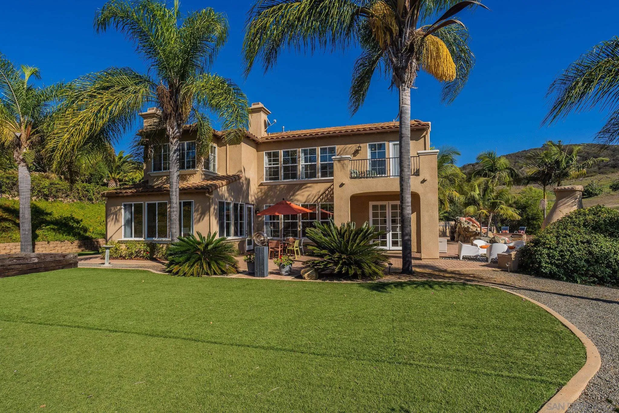 845 Vista Point Circle Vista, CA 92084 - Photo 45 of 58 a front view of a house with a garden