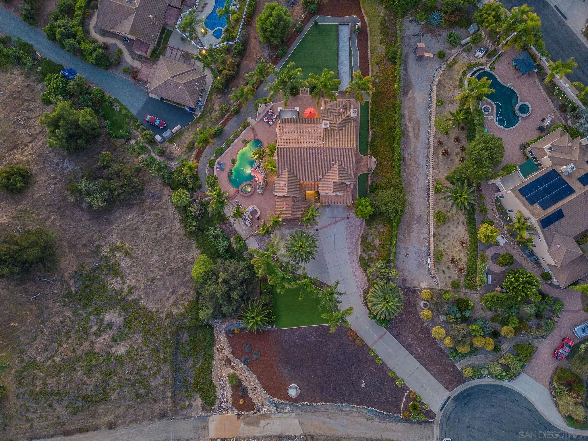845 Vista Point Circle Vista, CA 92084 - Photo 56 of 58 an aerial view of a house with a yard