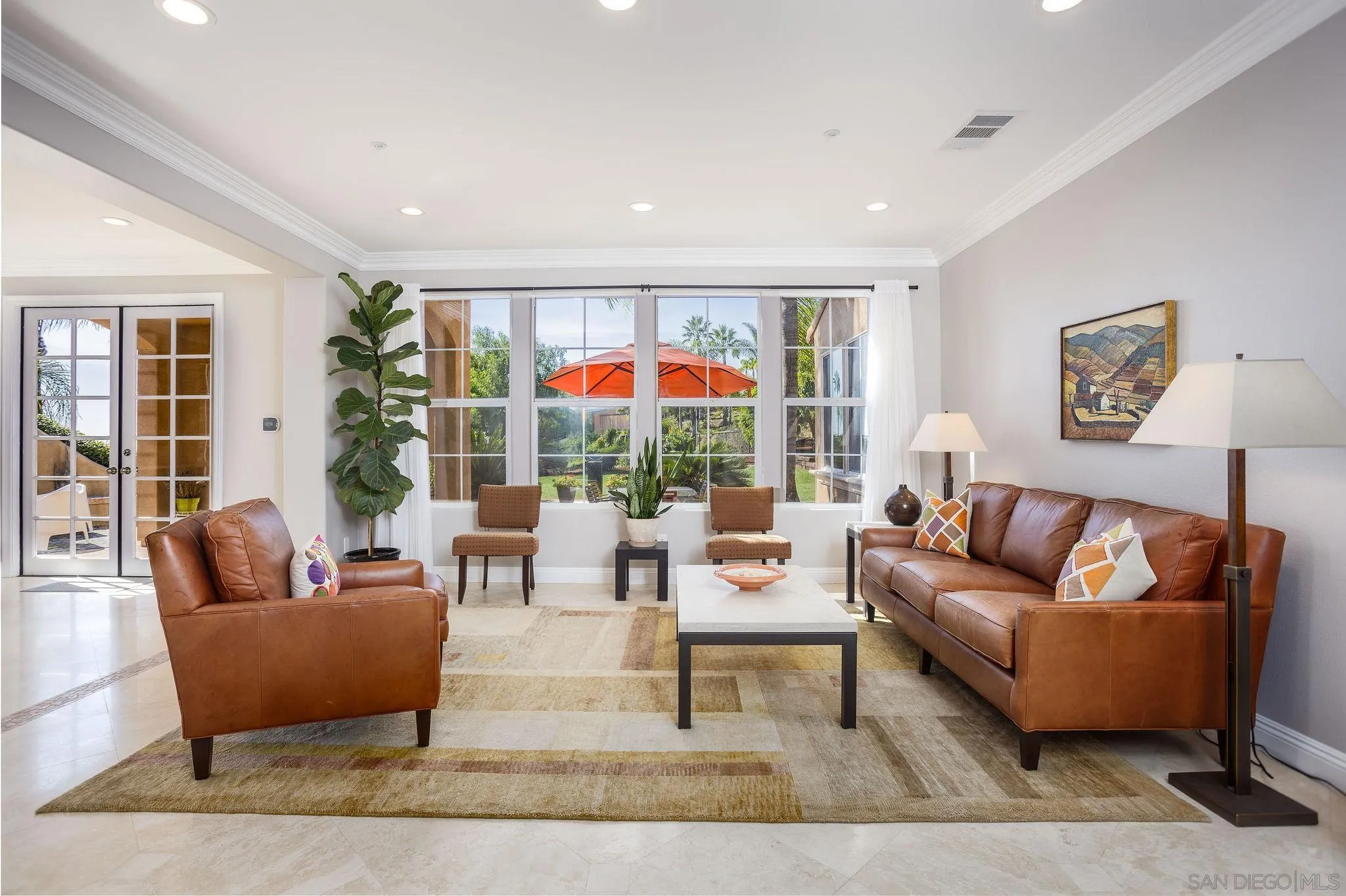 845 Vista Point Circle Vista, CA 92084 - Photo 6 of 58 a living room with furniture and a large window