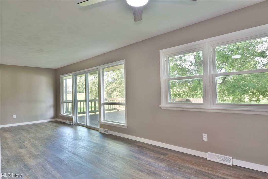5480 Phillips Rice Road Cortland, OH 44410 - Photo 13 of 35 Empty room featuring light hardwood floors