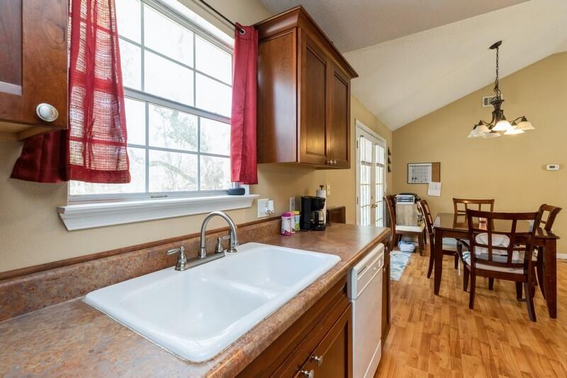 138 Edna Drive Crestview, FL 32536 - Photo 12 of 26 a kitchen with a table chairs and a window