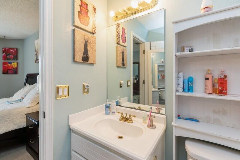 138 Edna Drive Crestview, FL 32536 - Photo 21 of 26 a bathroom with a sink and a mirror