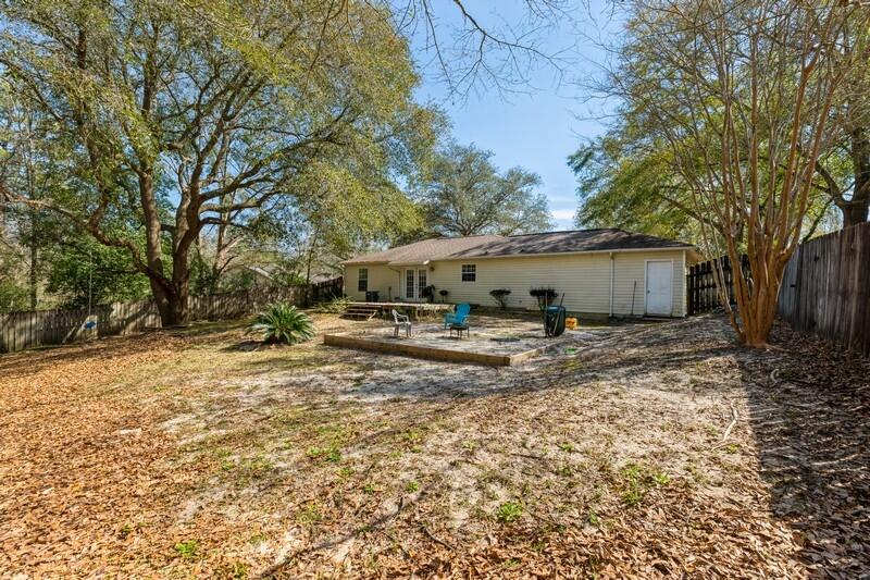 138 Edna Drive Crestview, FL 32536 - Photo 23 of 26 a view of a house with a yard