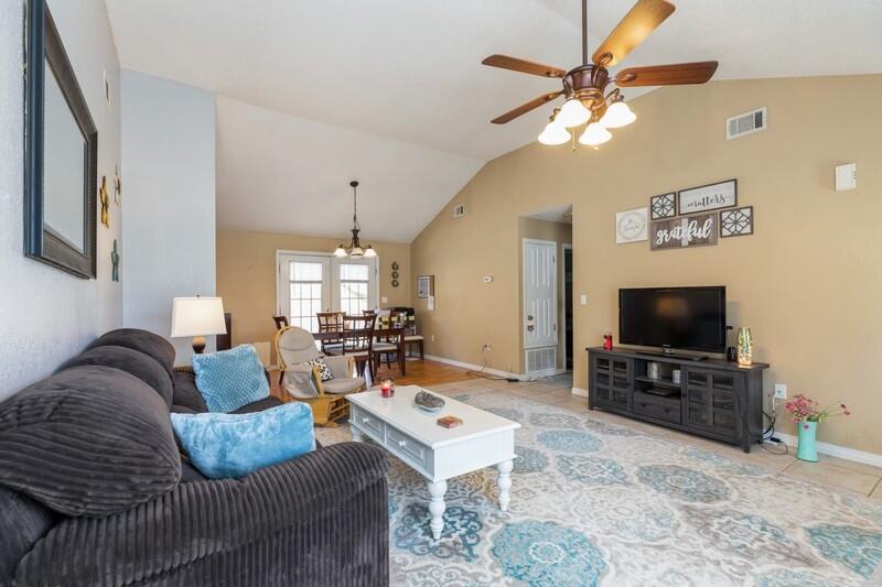138 Edna Drive Crestview, FL 32536 - Photo 6 of 26 a living room with furniture and a flat screen tv