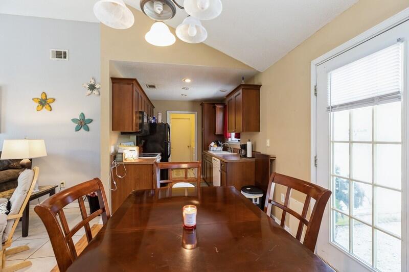 138 Edna Drive Crestview, FL 32536 - Photo 10 of 26 a view of kitchen with furniture and a large window