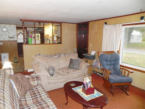 24 Wixon Road Dennis, MA 02639 - Photo 8 of 12 a living room with furniture and a window