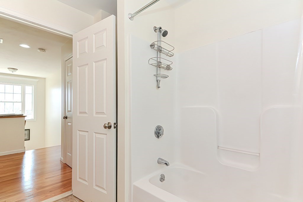 82 Swift Road Framingham, MA 01702 - Photo 35 of 39 a bathroom with a bathtub